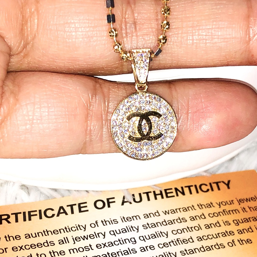 10k solid real gold iced out in genuine Swarovski VVS  crystals, free appraisal